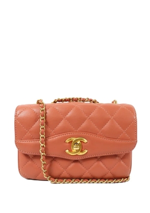 CHANEL Pre-Owned CC turn-lock shoulder bag - Orange