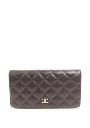 CHANEL Pre-Owned CC quilted long wallet - Black