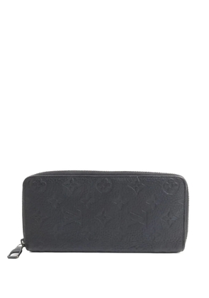 Louis Vuitton Pre-Owned zip-around Taurillon Monogram wallet - Black