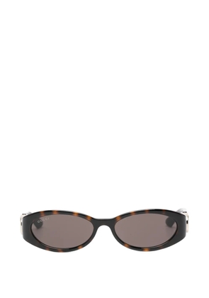 Gucci Pre-Owned Interlocking G oval-frame sunglasses - Brown