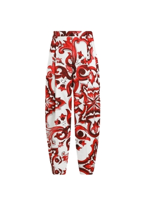 Dolce & Gabbana majolica-print drill trousers - White