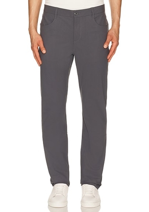 Vuori Meta Athletic Slim Fit Pant in Charcoal - Grey. Size 32 (also in 30, 33, 34, 36, 38).