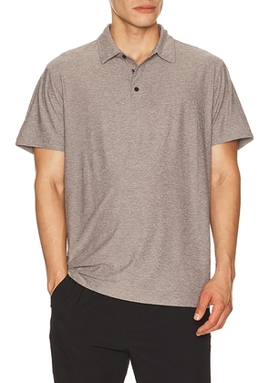 Vuori Strato Tech Polo in Heather Grey - Grey. Size M (also in S, L, XL/1X, XXL/2X).