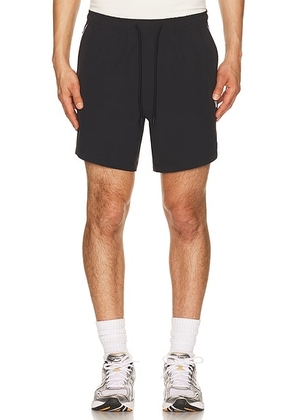Vuori Crosscourt Unlined 7 Short in Black - Black. Size L (also in S, M, XL/1X).