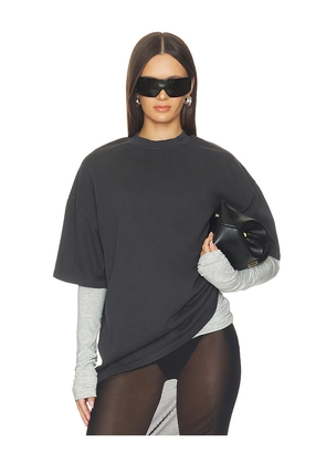 Fear of God ESSENTIALS Signature 90's Fit Tee in Black. Size XS. Also in S, M, L, XL.