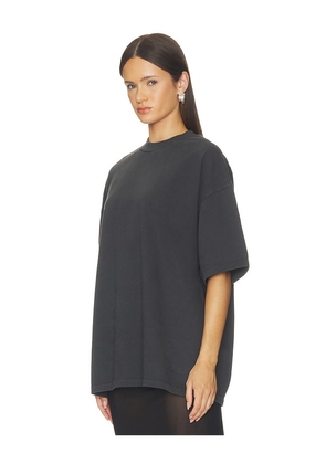 Fear of God ESSENTIALS Signature 90's Fit Tee in Black. Size XS. Also in S, M, L.