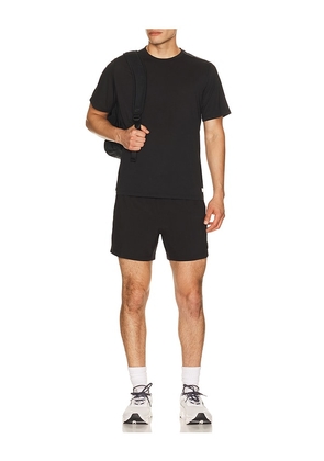 Vuori Current Tech Tee in Black. Size S. Also in M, L, XL/1X, XXL/2X.