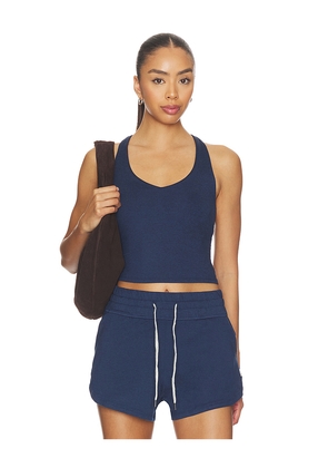 Vuori Halo Performance Crop Tank in Blue. Size XS. Also in S, M, L, XL.