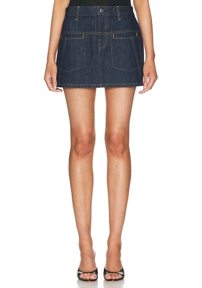 Helmut Lang Denim Mini Skirt in Rinsed Indigo - Blue. Size 28 (also in 24, 25, 26).