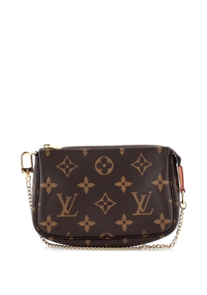 Louis Vuitton Pre-Owned Pochette Accessoires Monogram Canvas Mini clutch bag - Brown