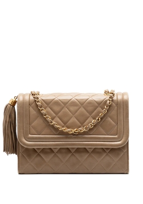 CHANEL Pre-Owned 1989-1991 Quilted Lambskin Tassel Flap crossbody bag - Neutrals