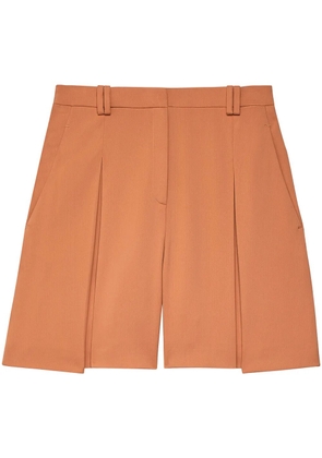 Another Tomorrow high-waisted pleated shorts - Orange