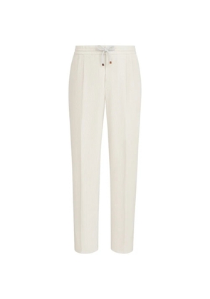 Brunello Cucinelli garment-dyed trousers in cotton corduroy with drawstring and double pleats - Neutrals