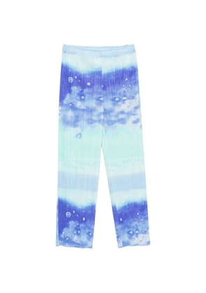 Pleats Please Issey Miyake pleated abstract-print trousers - Blue