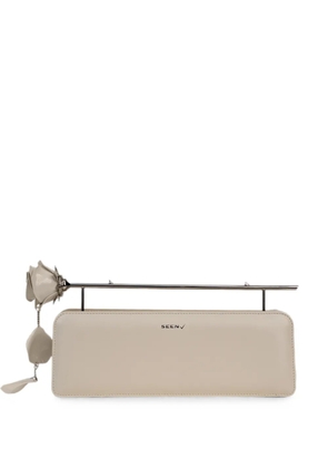 Seen Users Rose 11 floral-detail clutch bag - Neutrals