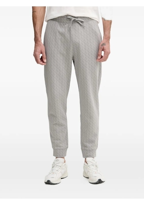 Armani Exchange monogram-pattern track pants - Grey