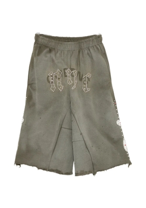 INNOCENCE NYC stud-embellished raw-edge baggy shorts - Green
