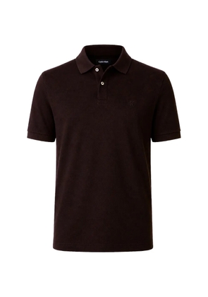Calvin Klein logo-embroidered polo shirt - Brown