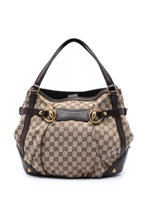 Gucci Pre-Owned 2016-2026 GG Canvas Jockey shoulder bag - Neutrals