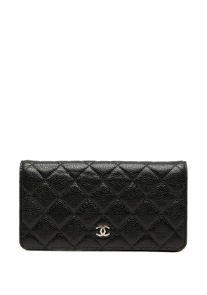 CHANEL Pre-Owned 2011 CC Quilted Caviar Yen Wallet long wallets - Black