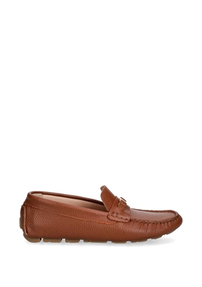 Pollini logo-plaque pebbled-leather loafers - Brown