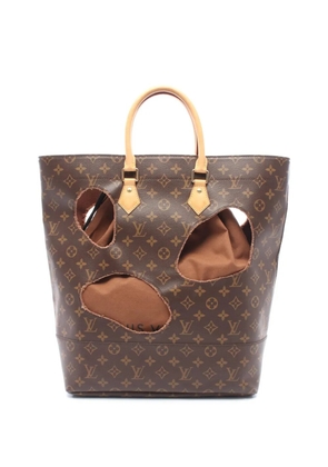 Louis Vuitton Pre-Owned 2014 x Rei Kawakubo Monogram Bag with Holes tote bag - Brown