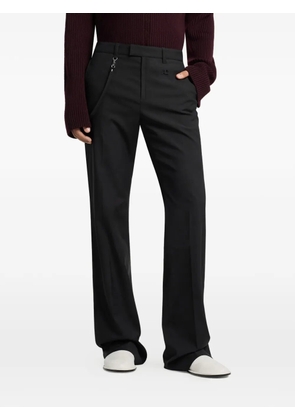 Courrèges logo-patch trousers - Black