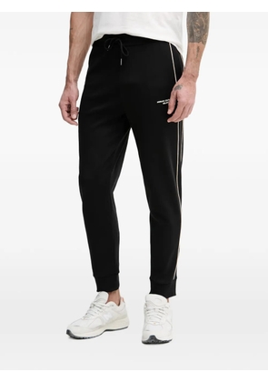 Armani Exchange logo-print piped track pants - Black