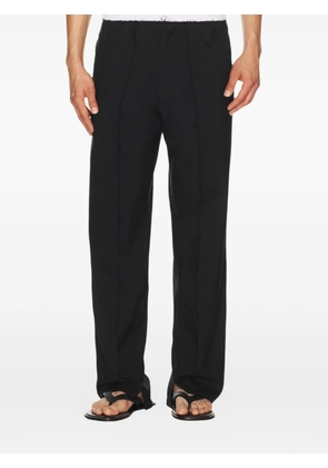 Spencer Badu frayed-edge panelled trousers - Black