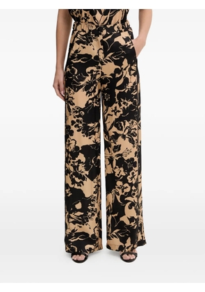 SIMONA CORSELLINI floral-print palazzo pants - Neutrals