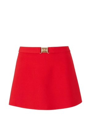 Cult Gaia Amoret logo-buckle A-line mini skirt - Red