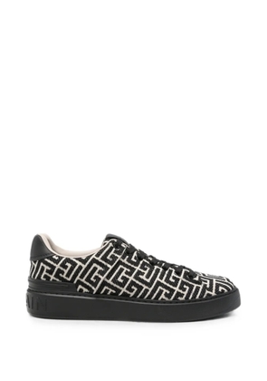 Balmain monogram logo-embossed sneakers - Black