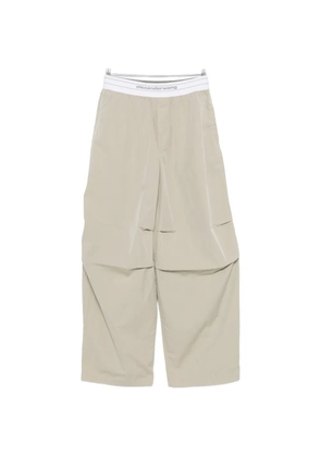 Alexander Wang logo-elastic pleated-knee trousers - Green
