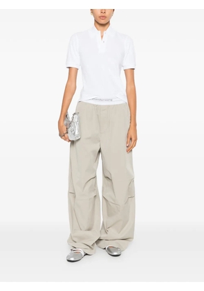 Alexander Wang logo-elastic pleated-knee trousers - Green
