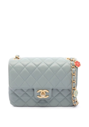 CHANEL Pre-Owned 2021-2026 Mini Square Lambskin Casino Royale Charms Single Flap crossbody bag - Blue