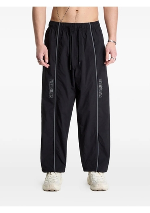 Pleasures Sound logo-print reflective-piping track pants - Black