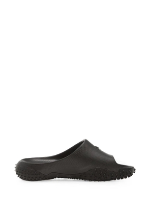 PUMA Mostro debossed-logo slides - Black