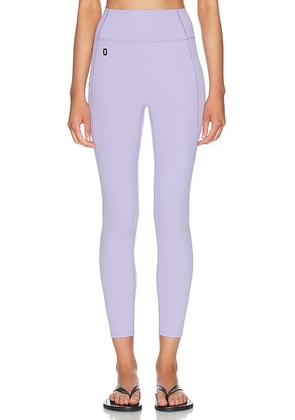 On Studio 7/8 Tights in Bloom - Purple. Size XS (also in S, M).