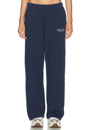 Sporty & Rich Vendome LA Embroidered Wide Sweatpant in Dark Navy - Navy. Size XS (also in S, M, L, XL).