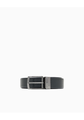 Reversible leather belt with embossed motif
