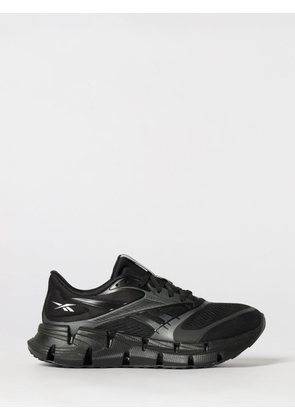 REEBOK Sneakers Men color Black