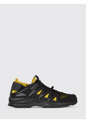 SALOMON Sneakers Men color Black