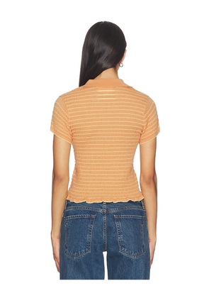 Guest In Residence Smocked Shrunken Polo in Orange. Size L. Also in S, XS, M.