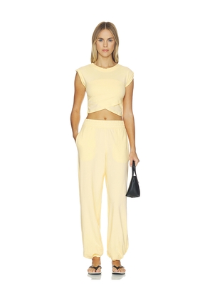 Free People x FP Movement Hot Shot Crossover Set in Yellow. Size L. Also in XS, S, M, XL.