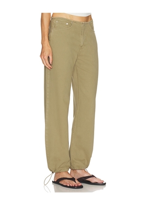 GRLFRND Erika Cinched Hem Jean in Olive. Size 23. Also in 24, 25, 26, 27, 28, 29, 30, 31, 32.