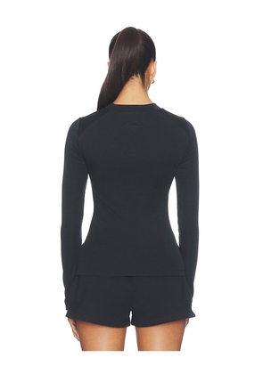 Fear of God ESSENTIALS Fitted Longsleeve Tee in Black. Size L. Also in XS, S, M, XL.