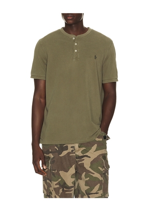 Polo Ralph Lauren Short Sleeve Garment Dyed Featherweight Mesh Henley T-Shirt in Olive. Size L. Also in S, M, XL/1X, XXL/2X.
