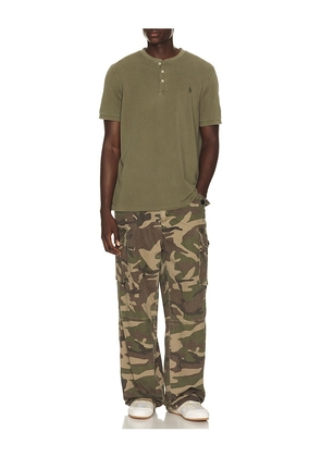 Polo Ralph Lauren Short Sleeve Garment Dyed Featherweight Mesh Henley T-Shirt in Olive. Size L. Also in S, M, XL/1X, XXL/2X.