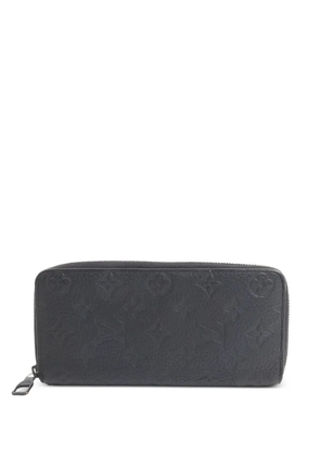 Louis Vuitton Pre-Owned zip-around Taurillon Monogram wallet - Black
