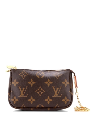 Louis Vuitton Pre-Owned Pochette Accessoires Monogram Canvas Mini clutch bag - Brown